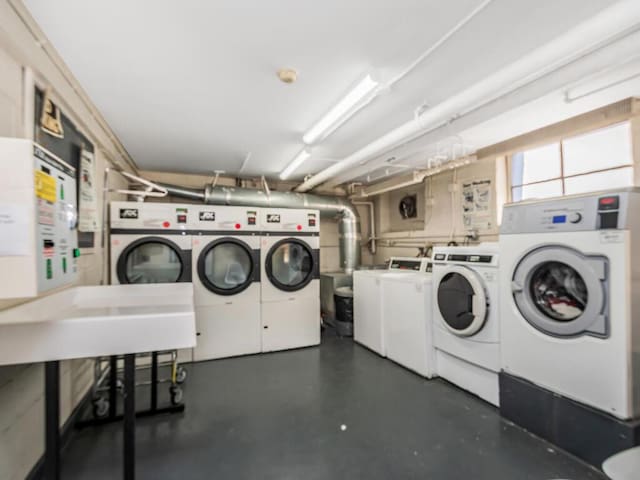 laundry room with separate washer and dryer