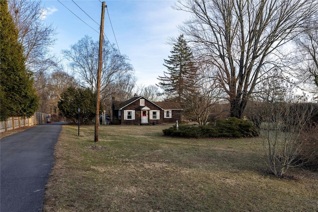 exterior space featuring a front yard