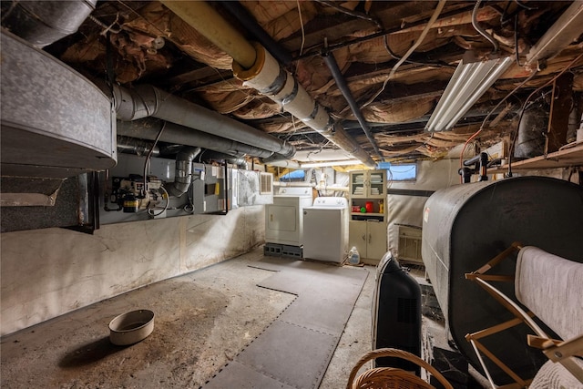 basement featuring washing machine and dryer