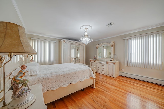 bedroom featuring light hardwood / wood-style floors, multiple windows, crown molding, and baseboard heating