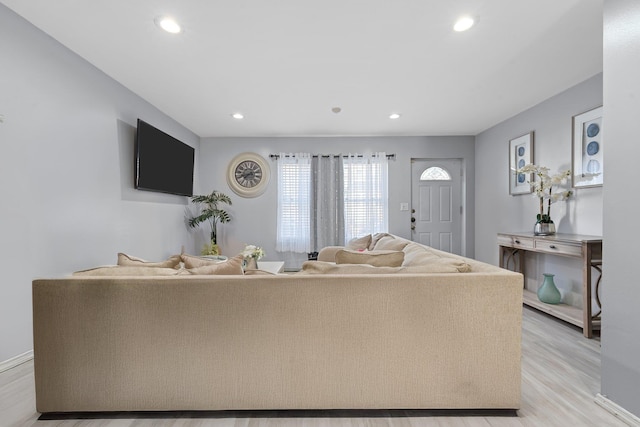 living room with light hardwood / wood-style floors