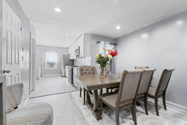 dining area featuring light hardwood / wood-style flooring