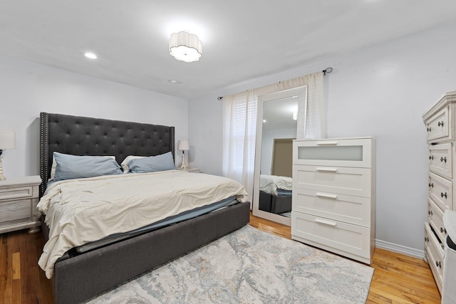 bedroom featuring light wood-type flooring