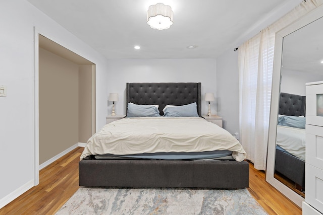 bedroom featuring hardwood / wood-style flooring