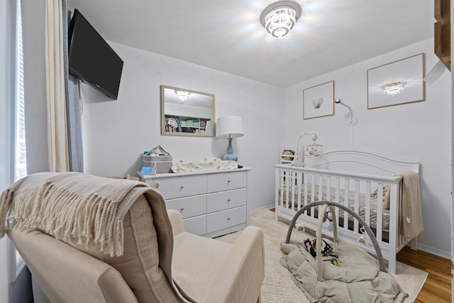 bedroom featuring light hardwood / wood-style floors