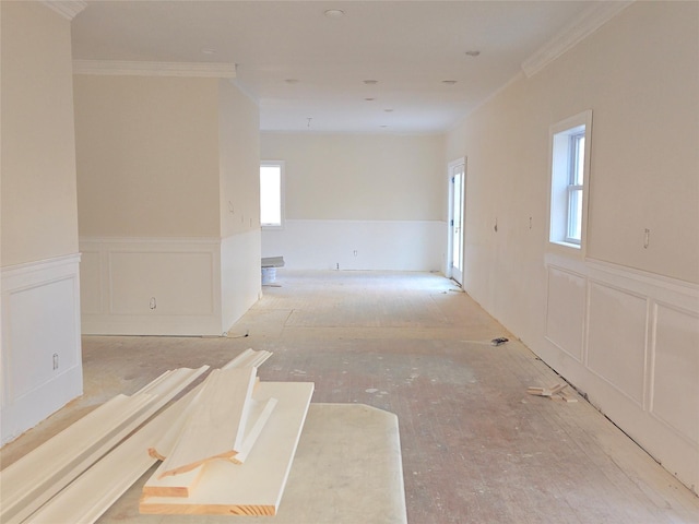 spare room featuring crown molding