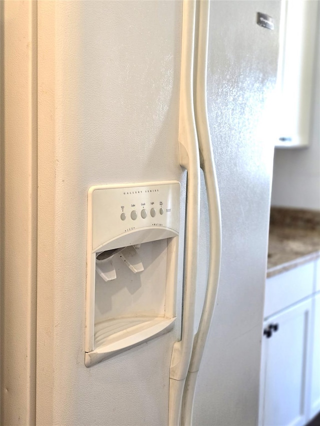 details with white fridge with ice dispenser