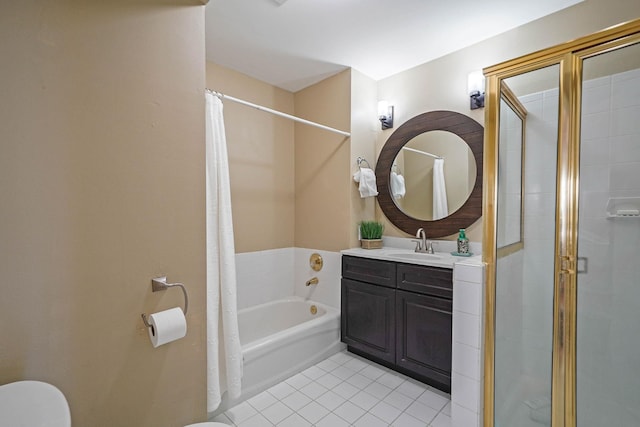 bathroom featuring vanity, plus walk in shower, and tile patterned floors