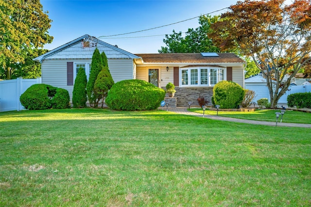 view of front of home with a front lawn