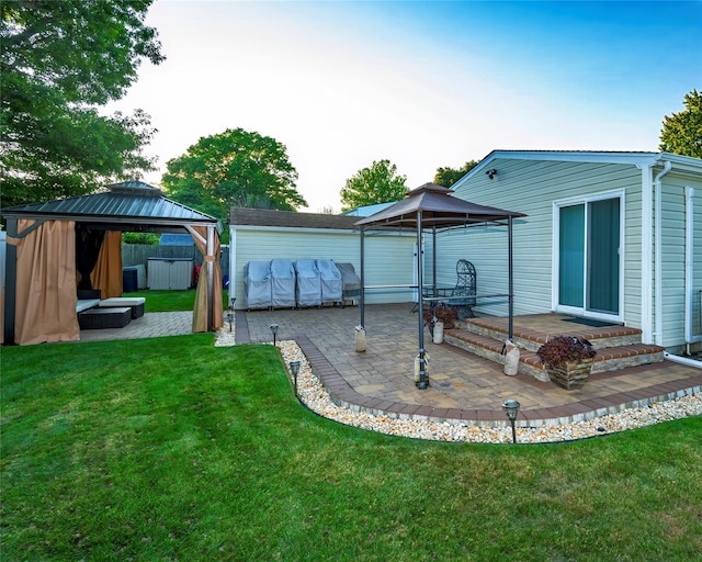 view of yard with a gazebo and a patio