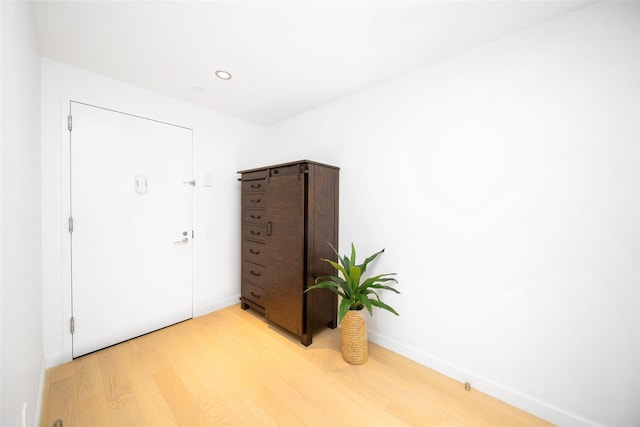 interior space with hardwood / wood-style floors