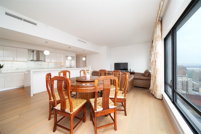 dining area featuring light hardwood / wood-style floors