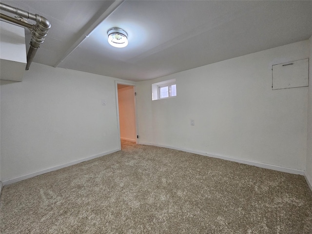 basement with carpet and baseboards