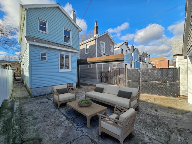 exterior space with outdoor lounge area, a patio, and fence