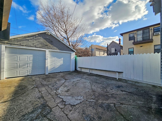 detached garage with fence