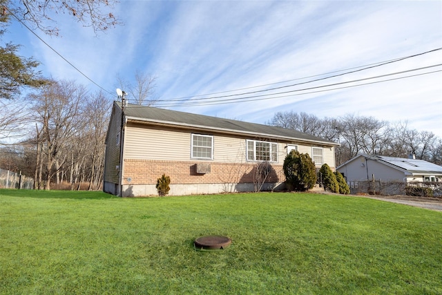 view of front of home featuring a front lawn