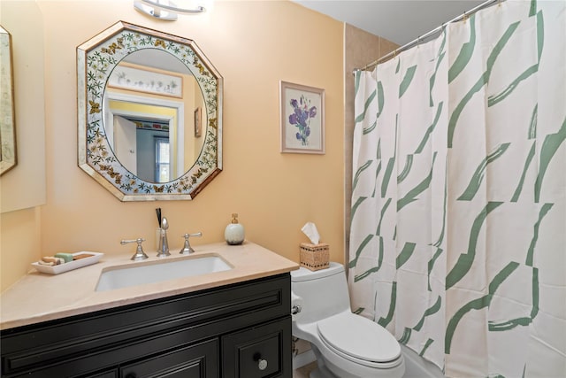 bathroom featuring toilet, walk in shower, and vanity