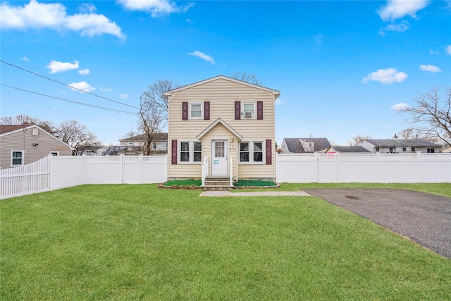 view of front of property with a front lawn