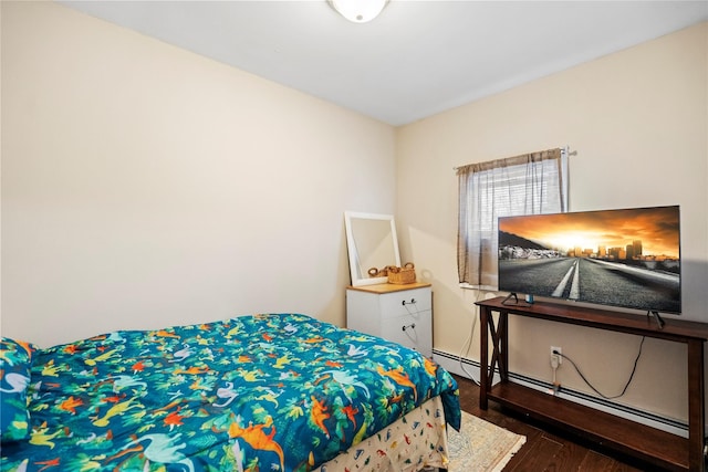 bedroom featuring dark hardwood / wood-style flooring and a baseboard radiator