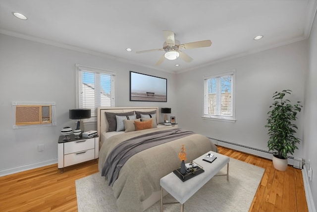 bedroom with ceiling fan, light wood-type flooring, ornamental molding, and a baseboard radiator