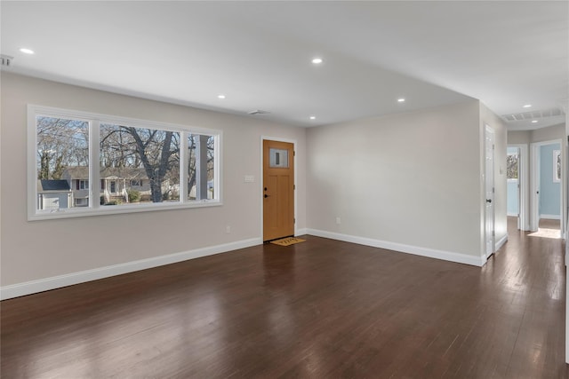 interior space with dark hardwood / wood-style floors