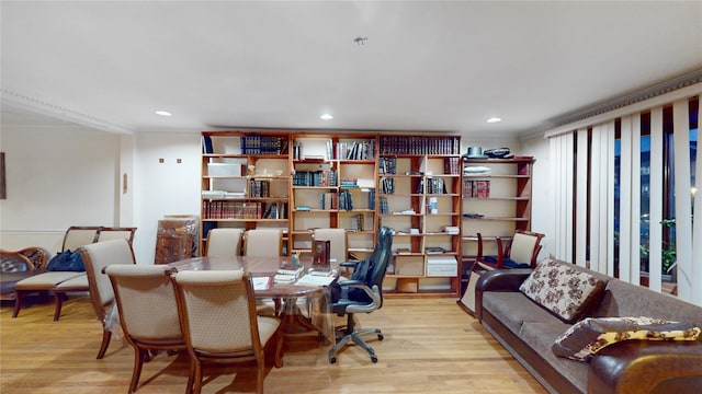 office space featuring light hardwood / wood-style floors and ornamental molding