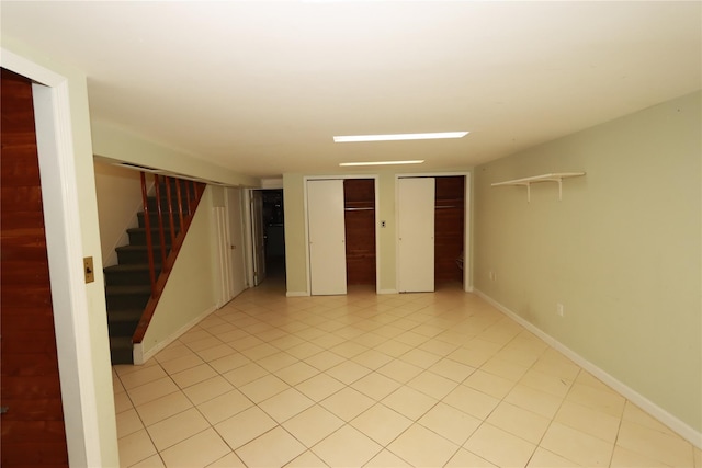 basement with light tile patterned floors