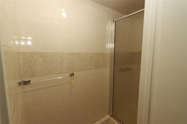 bathroom featuring an enclosed shower