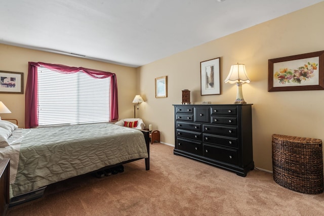 bedroom with light carpet