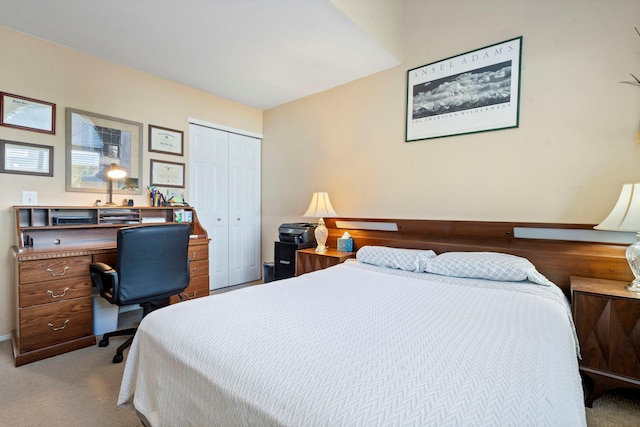 carpeted bedroom featuring a closet