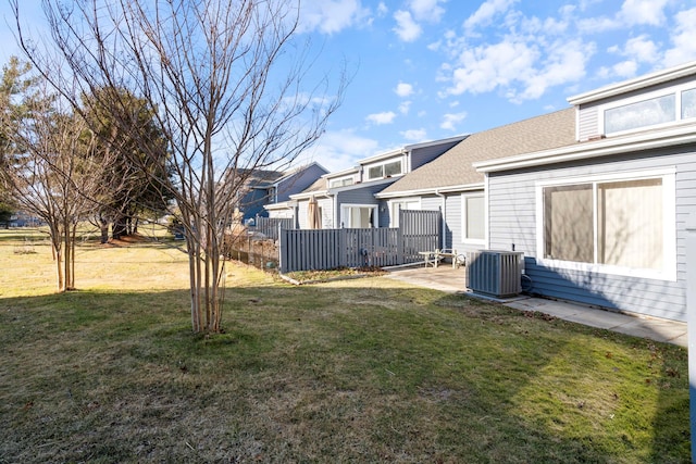 view of yard featuring a patio and central air condition unit