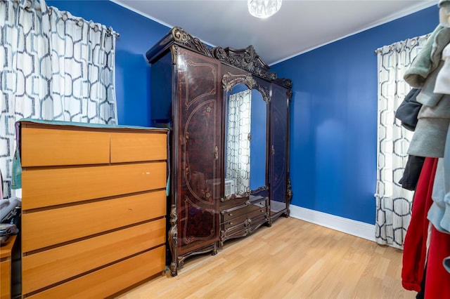 bedroom with light hardwood / wood-style floors