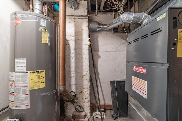 utility room featuring heating unit and water heater