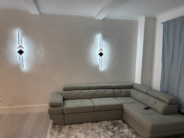 living room with beam ceiling, wood-type flooring, and crown molding