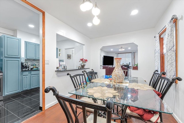 dining area featuring dark hardwood / wood-style flooring