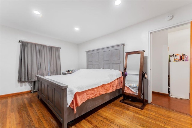 bedroom featuring wood-type flooring