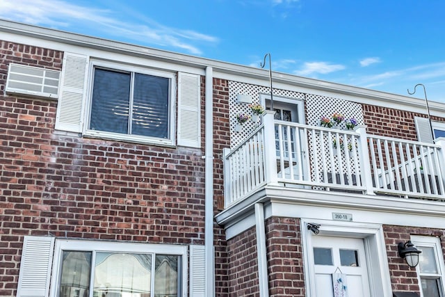 view of home's exterior featuring a balcony