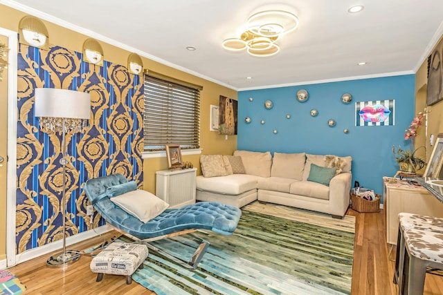 living room with wood-type flooring and ornamental molding