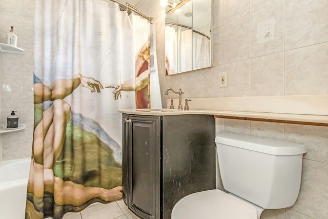 full bathroom featuring tile walls, toilet, shower / bath combo, and tile patterned flooring