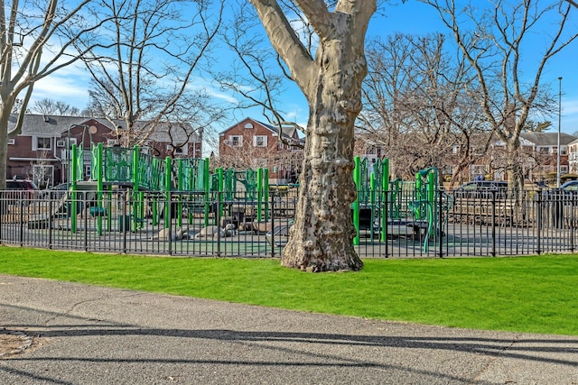 view of play area featuring a lawn