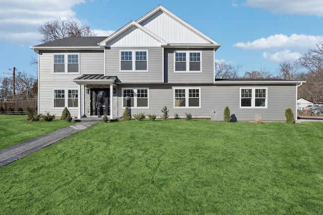 view of front facade featuring a front yard