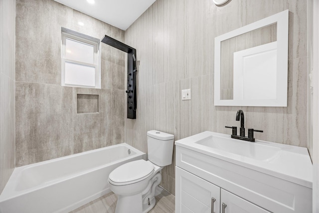 full bathroom with shower / bathing tub combination, vanity, and toilet