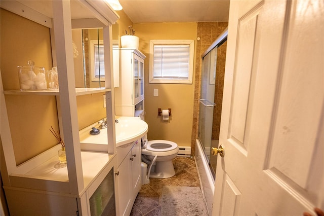 full bathroom with bath / shower combo with glass door, vanity, a baseboard radiator, and toilet