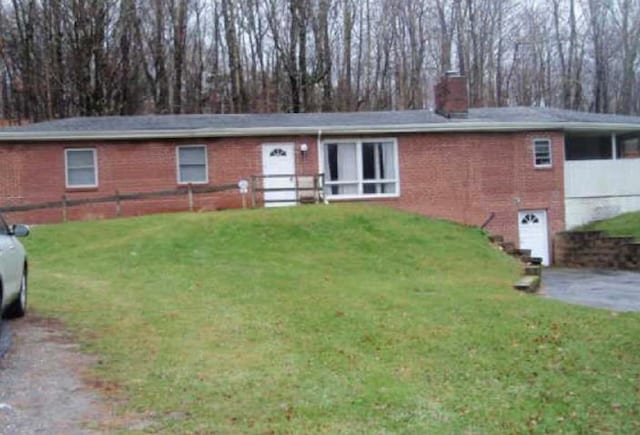 176 Doansburg Rd Unit 172, Brewster, NY 10509 - single story home with brick siding and a front lawn