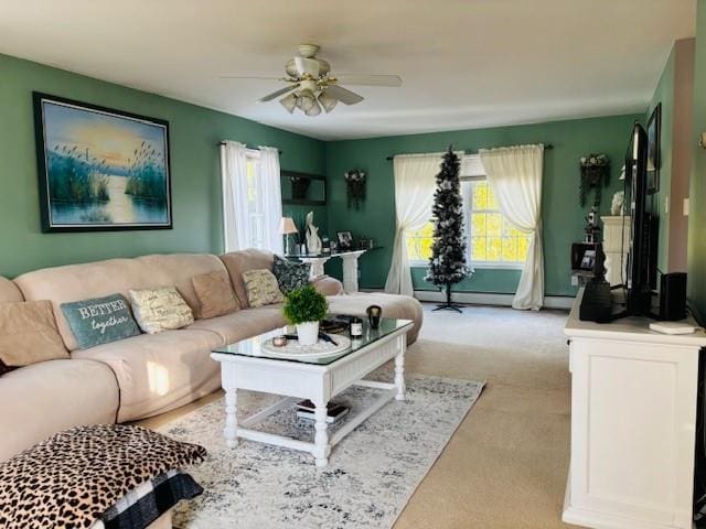 living room featuring light carpet, ceiling fan, and a baseboard radiator