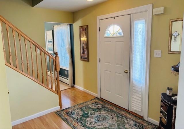 foyer with light wood-type flooring