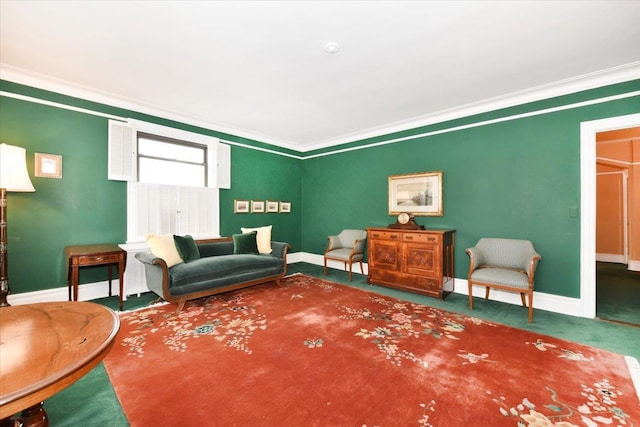 living area with carpet flooring and ornamental molding