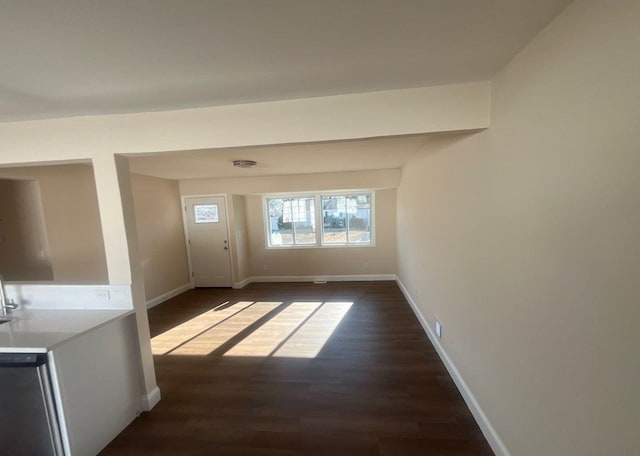 interior space with dark hardwood / wood-style floors