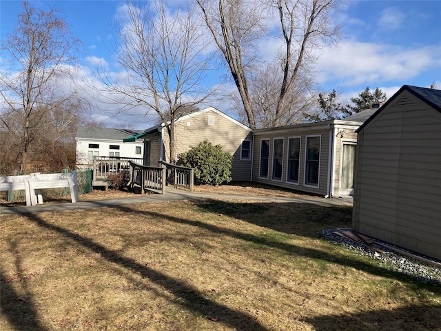 view of yard with a deck