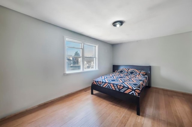 bedroom featuring hardwood / wood-style flooring